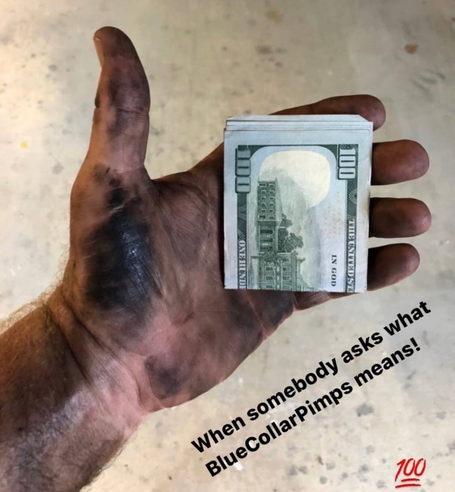 A grease-stained hand holding a folded stack of hundred-dollar bills, captioned: When somebody asks what BlueCollarPimps means!