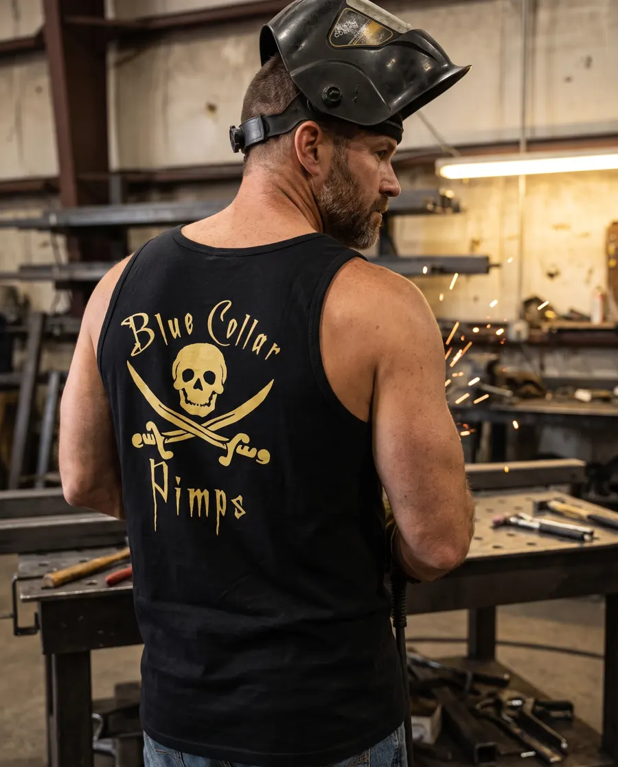 Welder in a black BCP tank in a fabrication shop